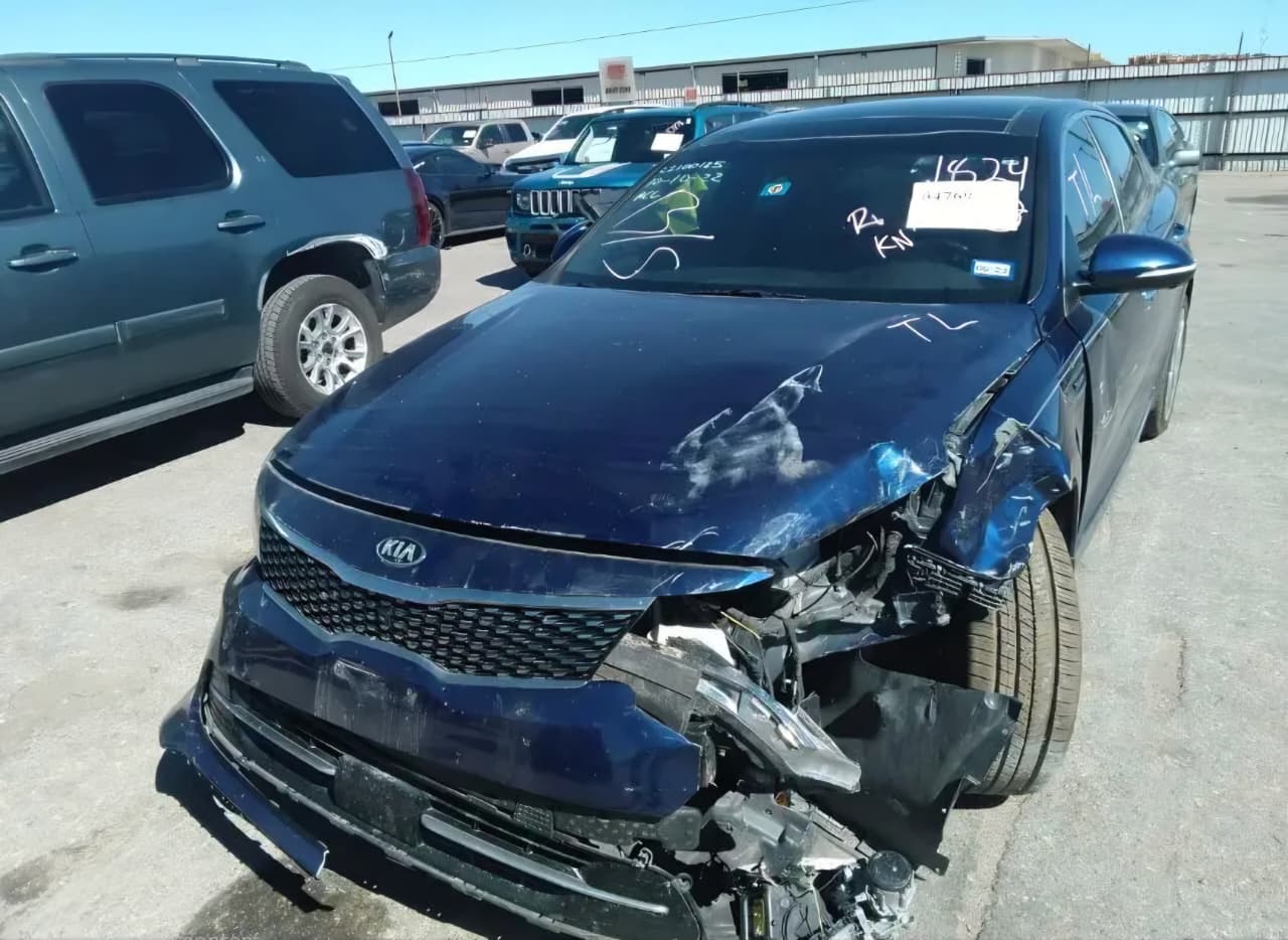 2017 Kia Optima VIN 5XXGV4L27GG059527 – photo 1